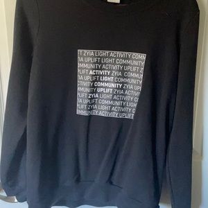 Zyia long sleeve tip with uplifting saying on front
